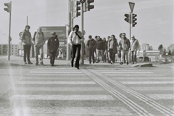 One step ahead of the world behind her